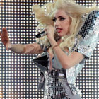Platinum Blonde Artist Singing in Dramatic Outfit