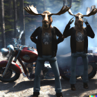 Anthropomorphic Moose Characters in Leather Jackets by Motorcycle