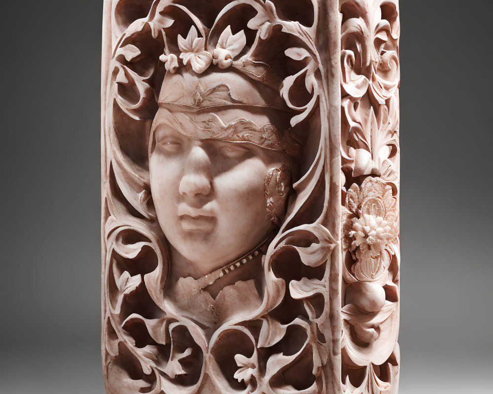 Intricate Woman's Face Carving on Stone Cylinder