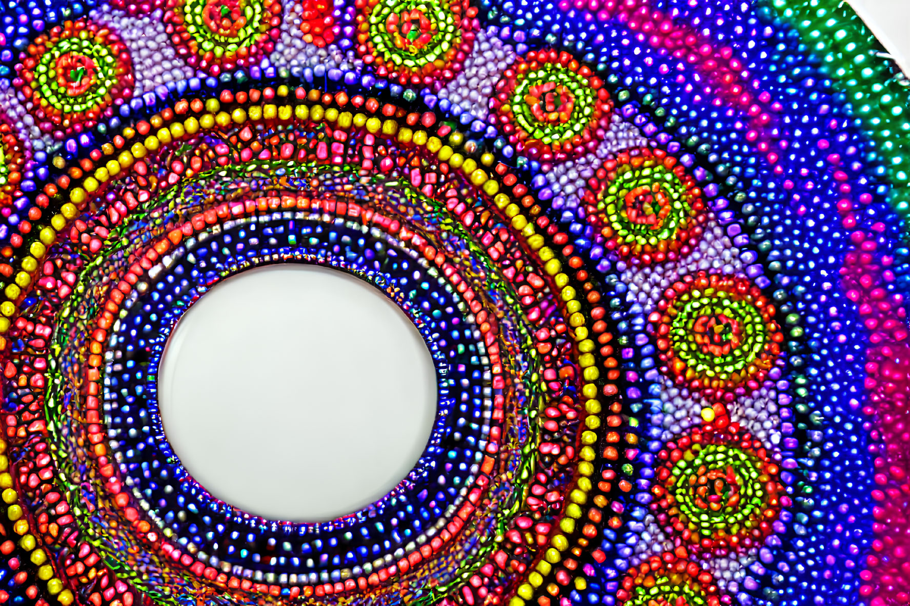 Colorful Mandala Pattern with Bead-like Details in Rainbow Hues