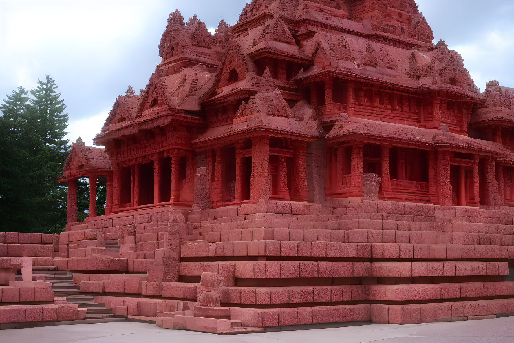 Intricately Carved Red Sandstone Temple with Ornate Detailing