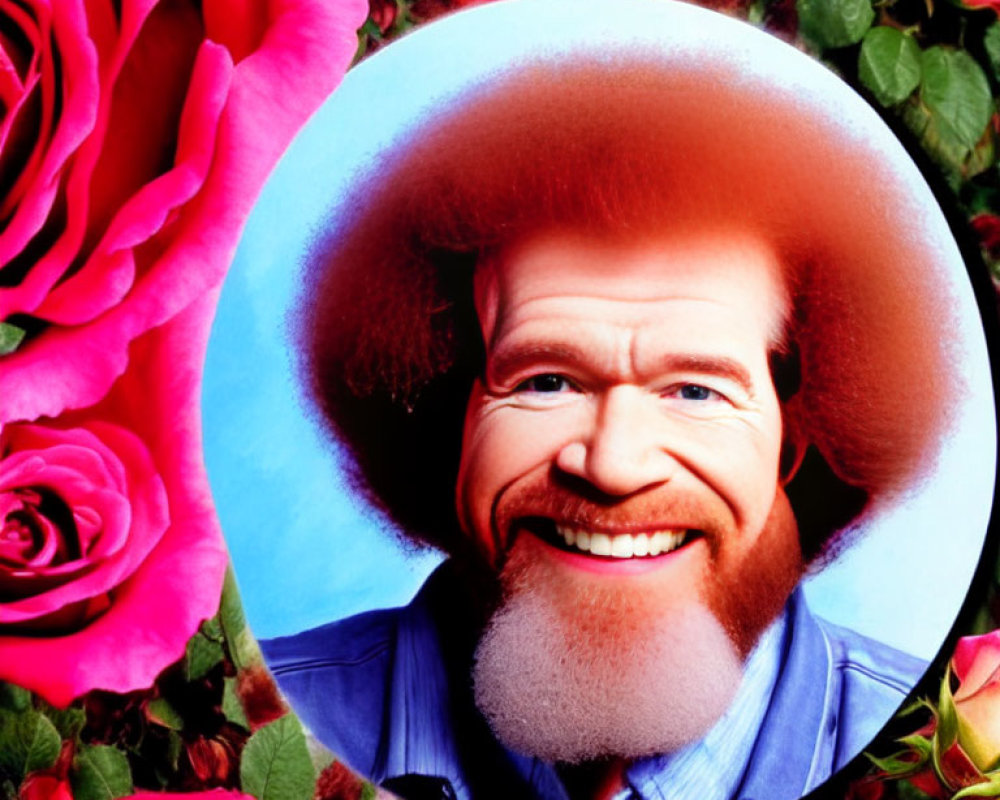 Smiling man with ginger afro and denim shirt in circular backdrop with red roses