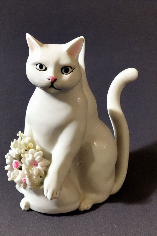 White Sitting Cat Porcelain Figurine with Pink Ears and Flower Bouquet