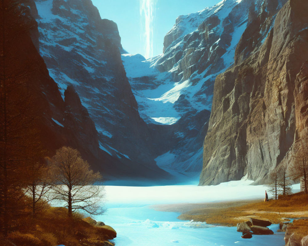 Snowy Mountain Valley with Frozen River and Waterfall