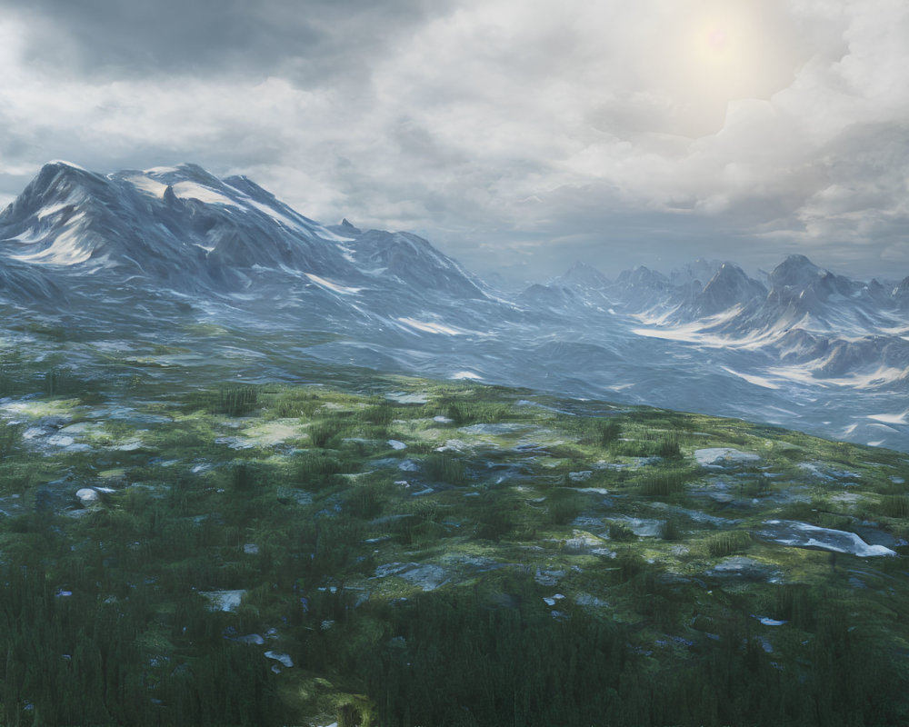 Snow-capped mountains and green meadow landscape under hazy sun