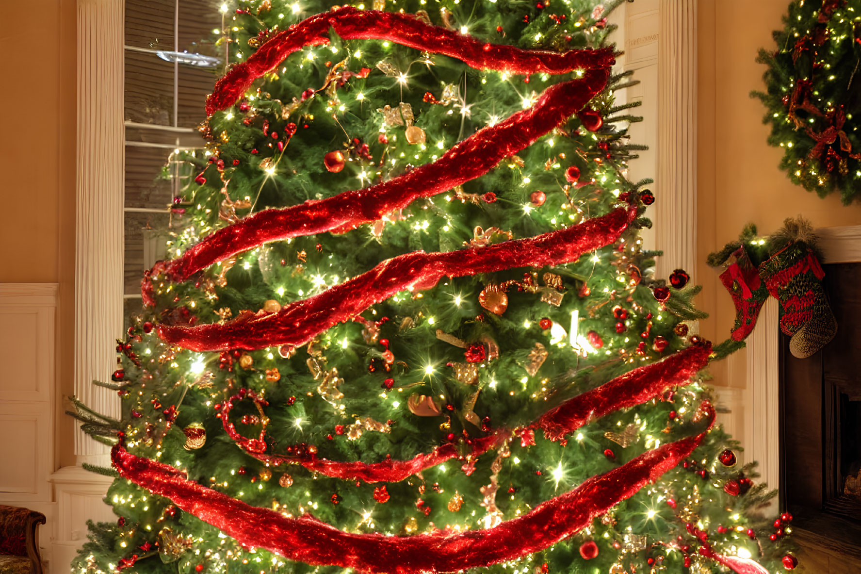 Festive Christmas tree with red garlands, lights, ornaments, and stockings