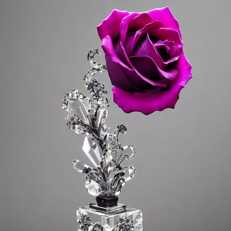 Purple Rose on Crystal Stem with Metal Leaves Against Gray Background