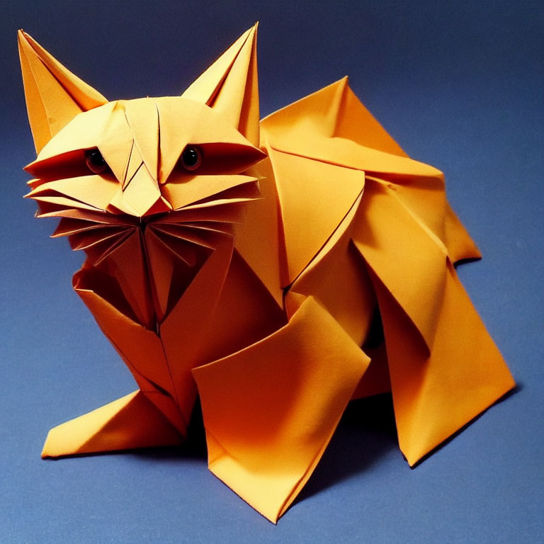 Orange Origami Cat with Pointed Ears on Blue Background