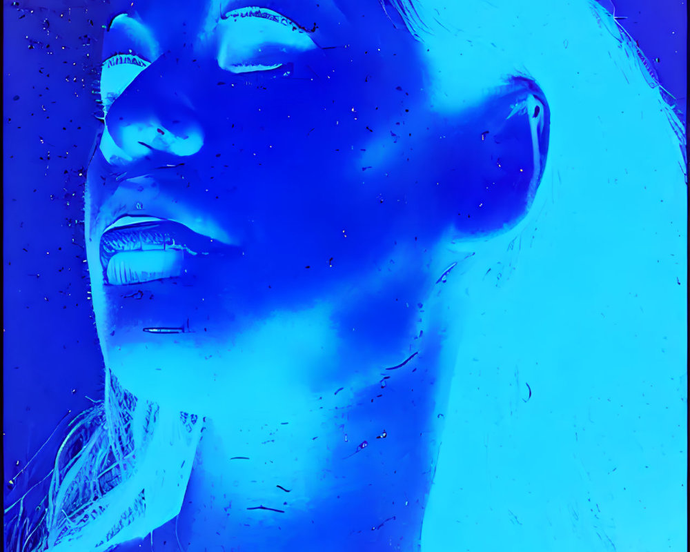 Side-profile portrait with vibrant blue and purple thermal filter effect.