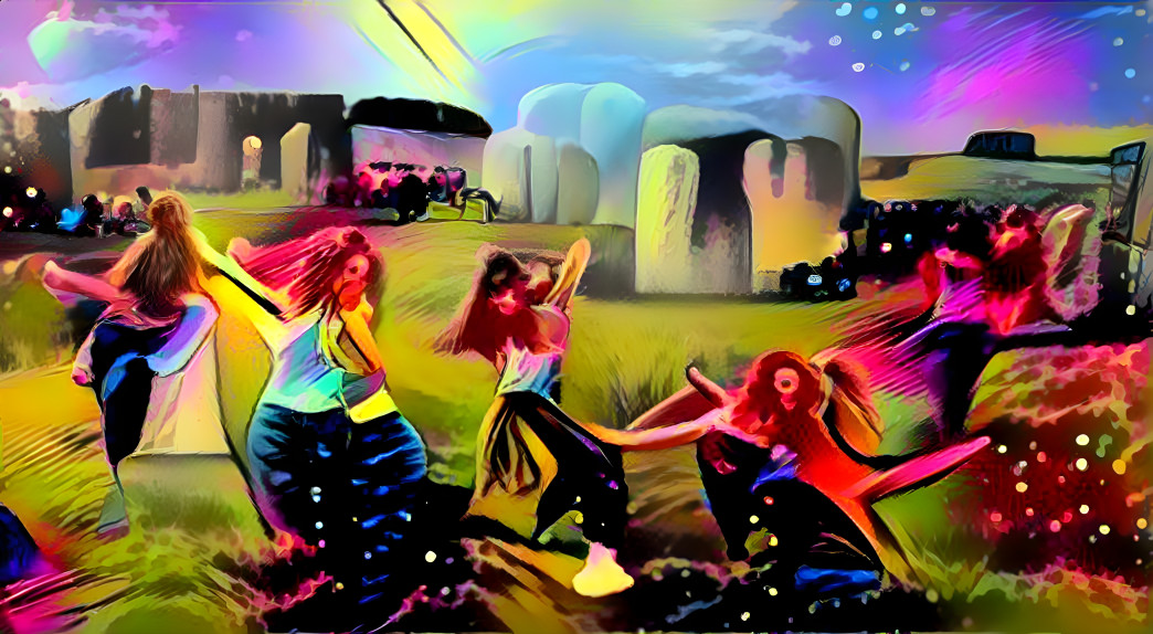 Young women dancing near Stonehenge #2