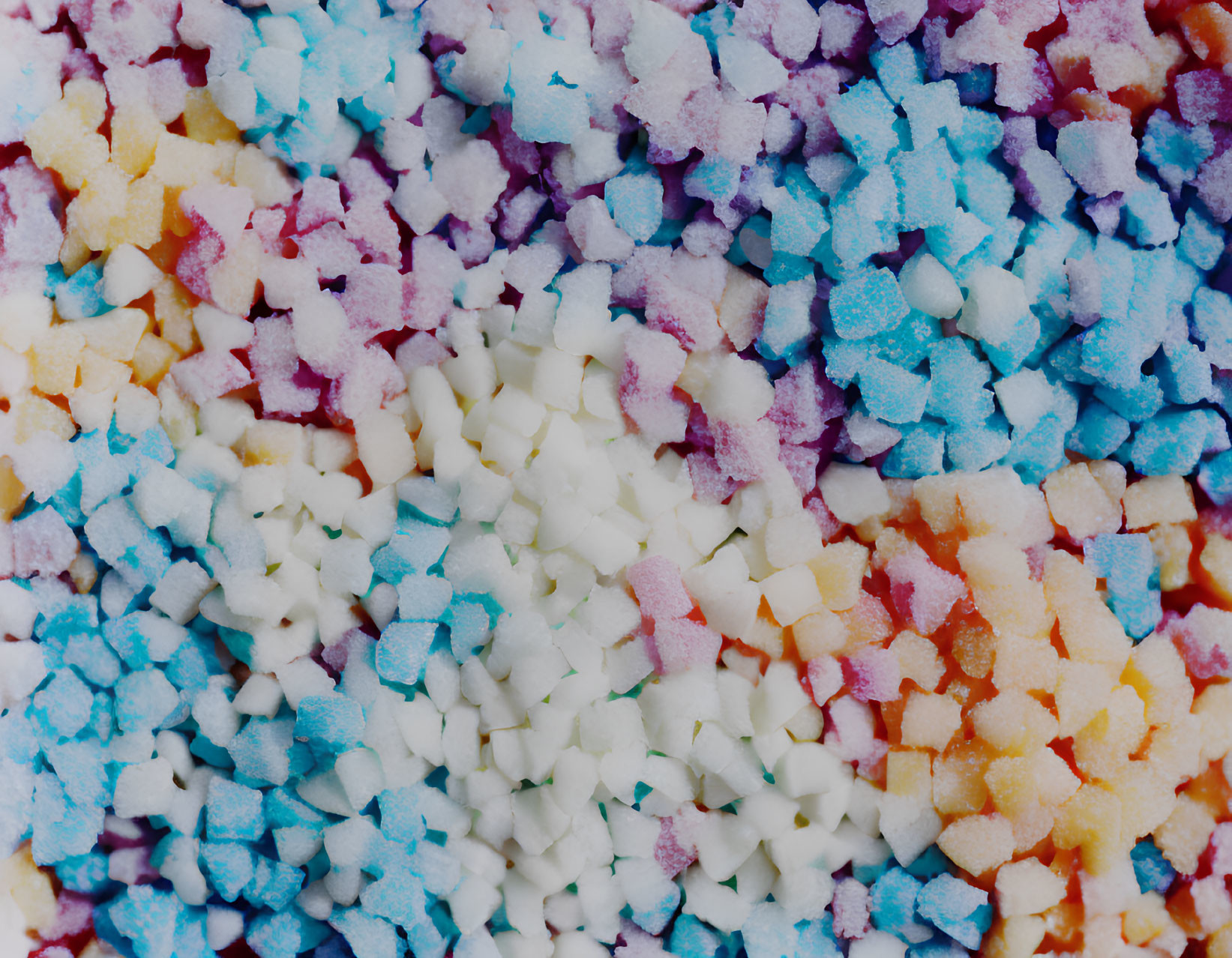 Vibrant circular gradient of colorful granulated particles