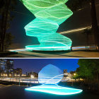 Geometric Sculpture and City Skyline Reflecting in Night Sky