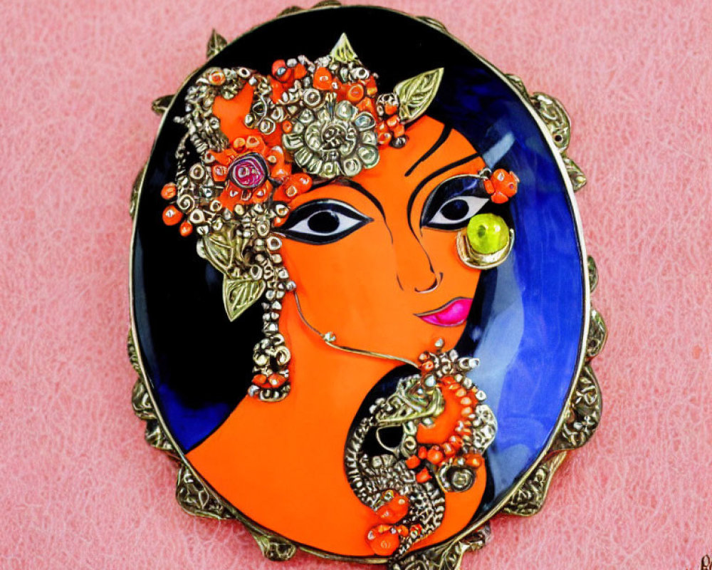 Colorful hand-painted plate with stylized woman's face and traditional jewelry on blue and orange background