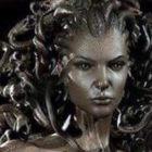 Woman with serpent hair reminiscent of Medusa in mythology