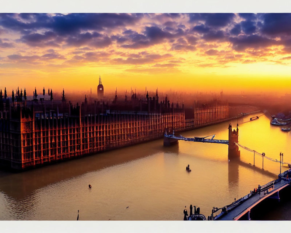 Golden sunset over River Thames with Houses of Parliament and Big Ben silhouettes in London.