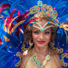 Vibrant carnival costume with feathered headdress and bejeweled mask