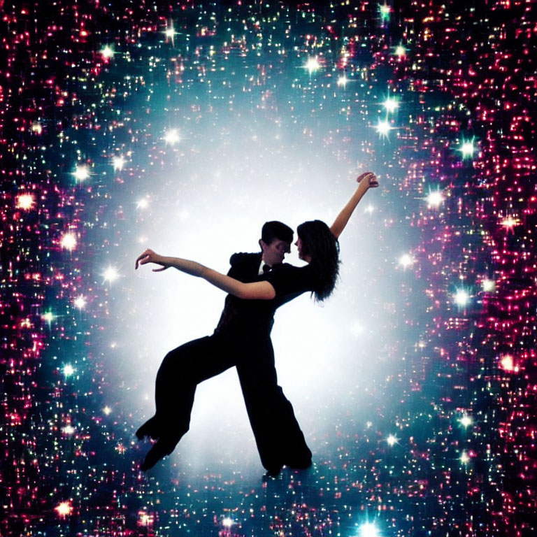 Man and woman in dance pose against starry space background