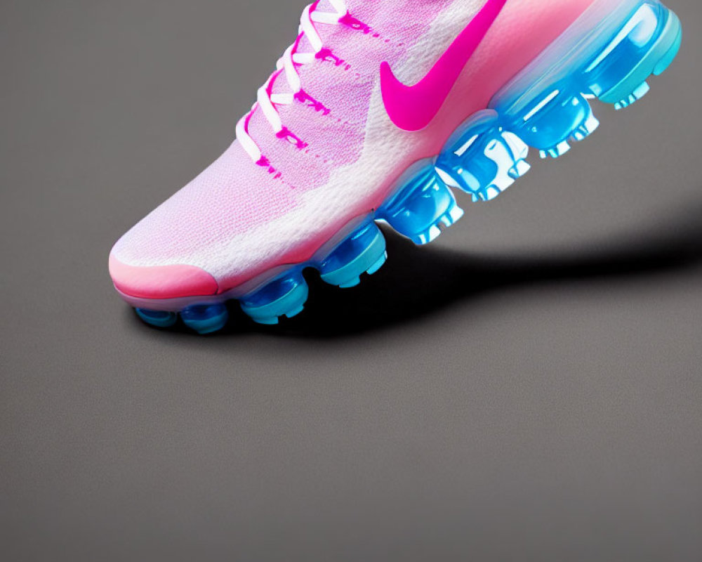 Colorful Pink and Blue Sports Shoe on Gray Background