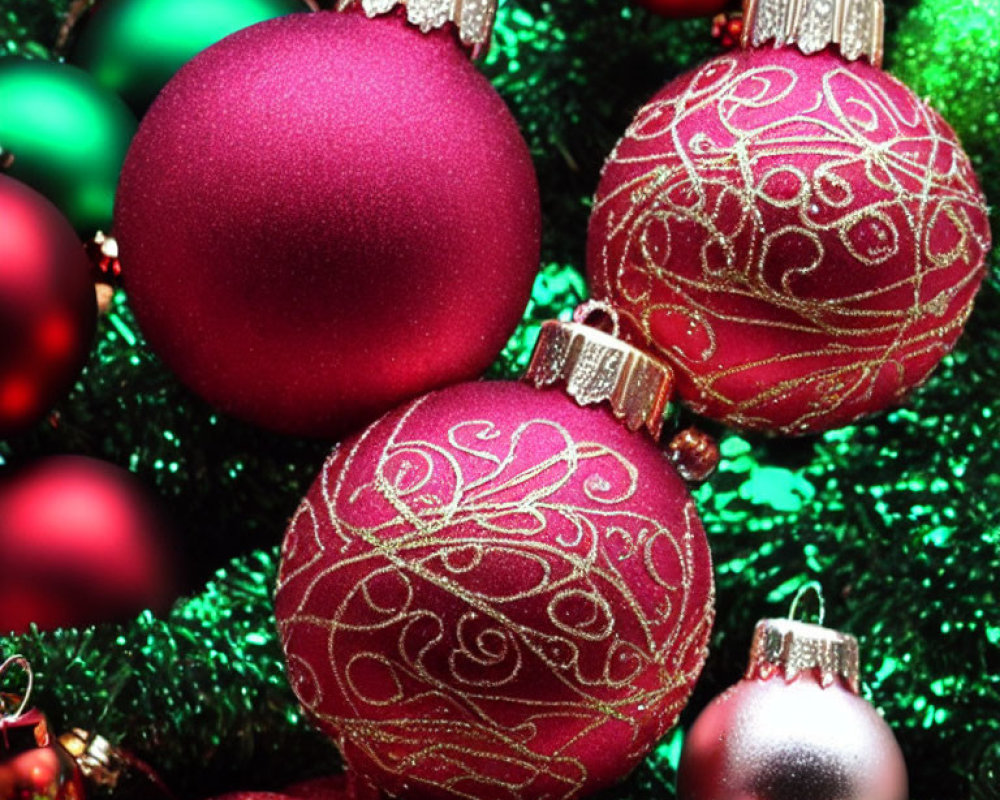 Colorful Christmas Ornaments on Green Tinsel Background