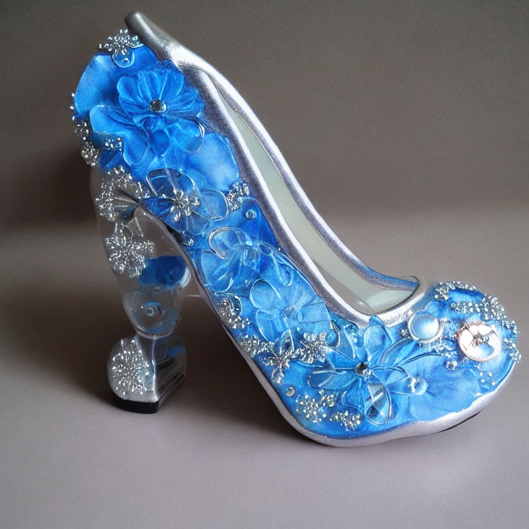 Blue High-Heeled Shoe with Floral Accents and Rhinestones