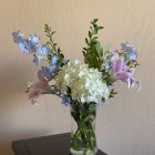 Colorful Mixed Flower Bouquet in Glass Vase with Pink Roses, White Daisies, and