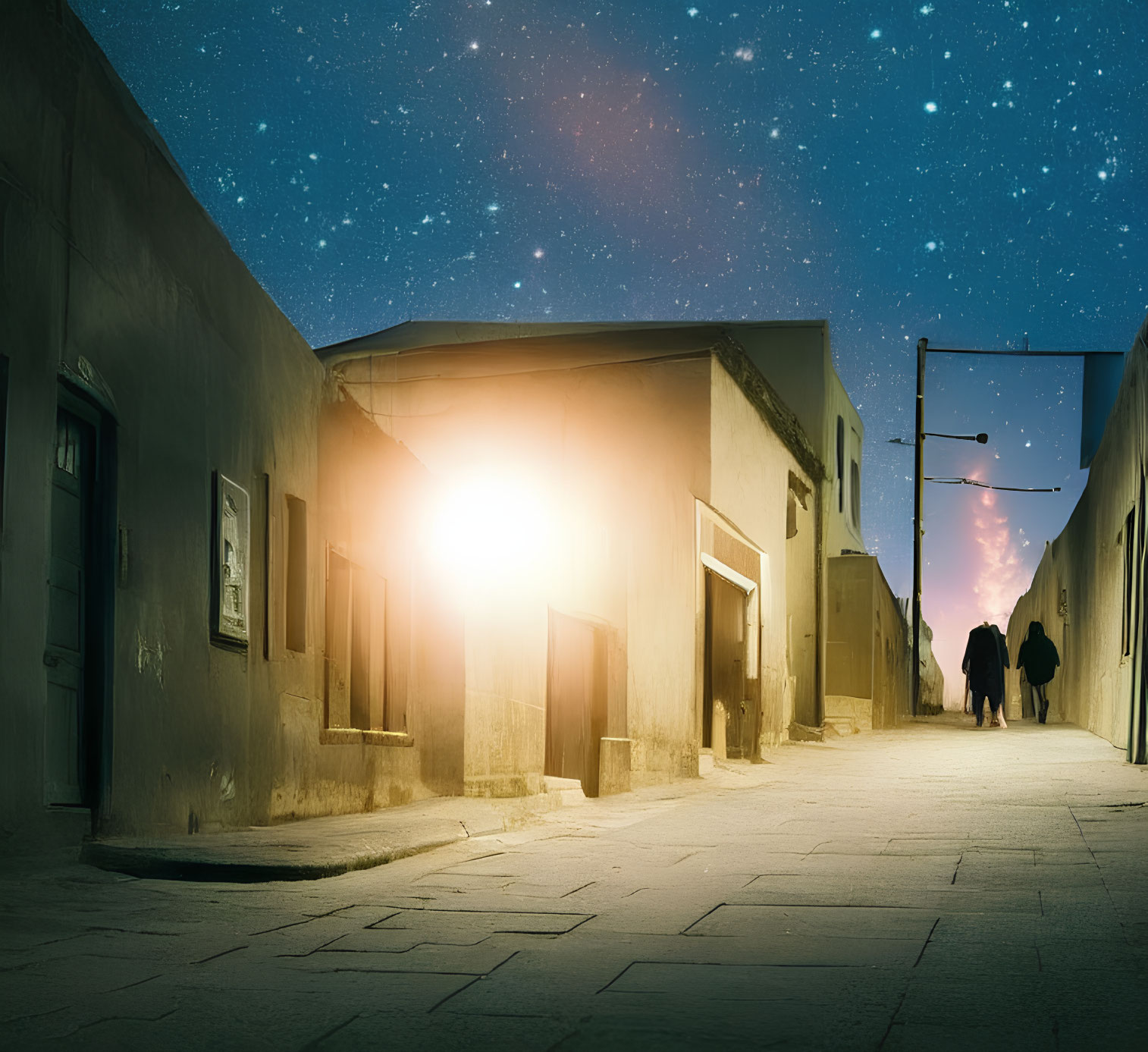Narrow street at dusk with long shadows and two people walking under starry sky