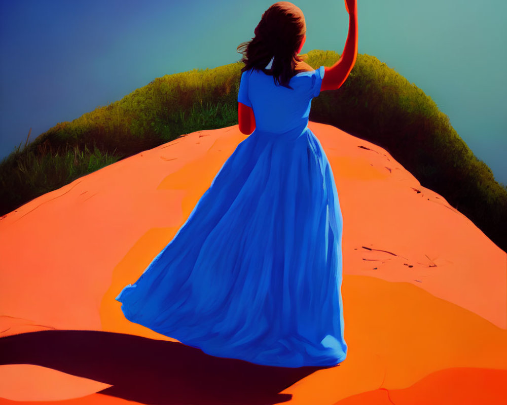 Woman in Flowing Blue Dress with Orange Scarf on Sandy Hill