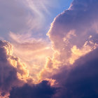 Dramatic sky with billowing clouds in purple, blue, and orange.