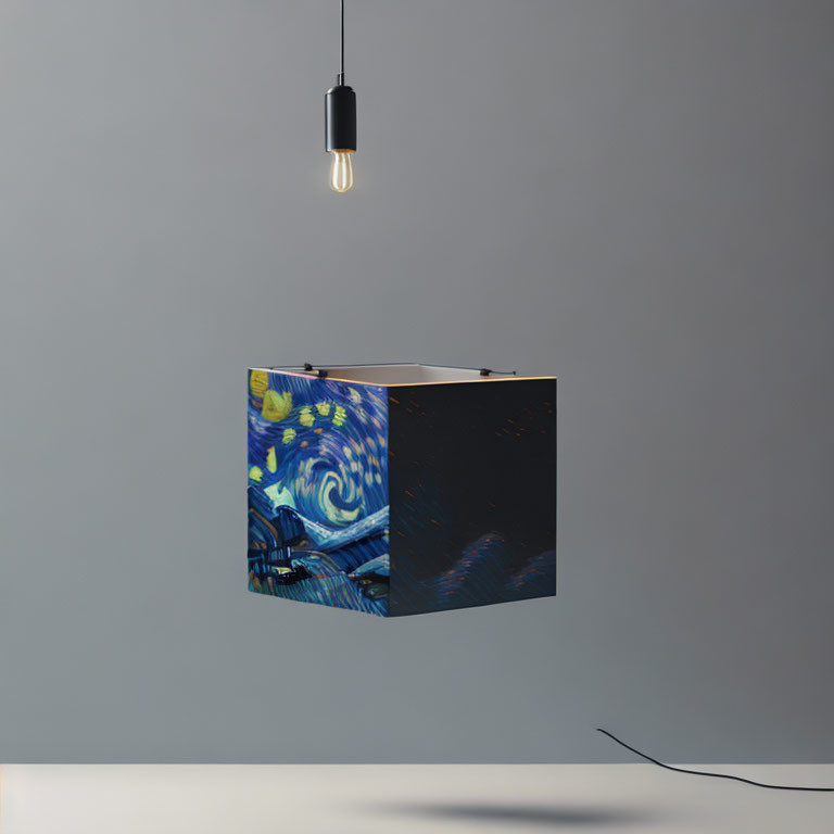 Cube Lamp with Segment of Starry Night Painting Hanging Against Gray Backdrop