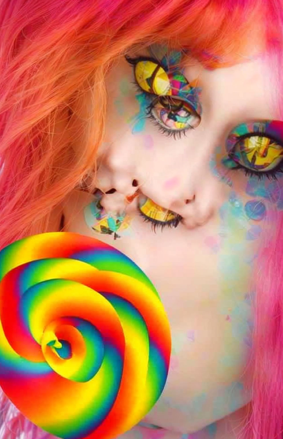 Vibrant rainbow makeup and pink hair with swirled lollipop