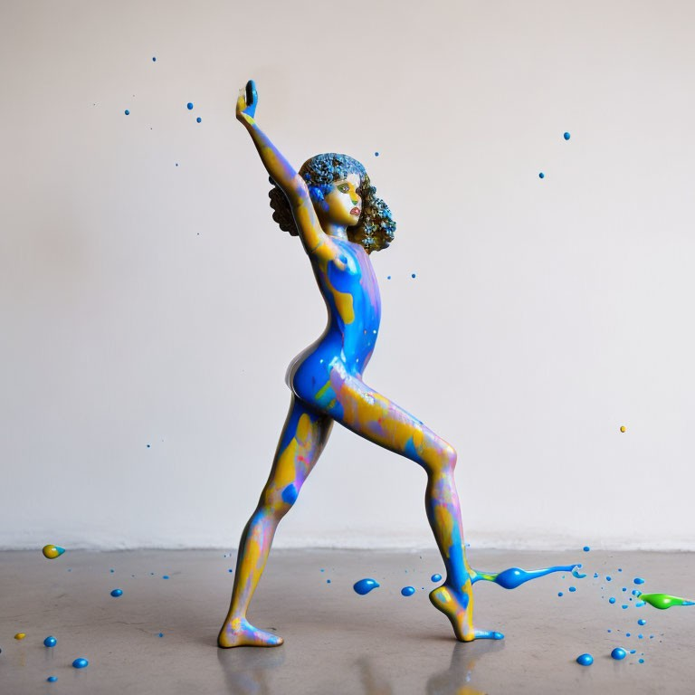 Blue Painted Person in Dynamic Pose with Yellow and Purple Splashes