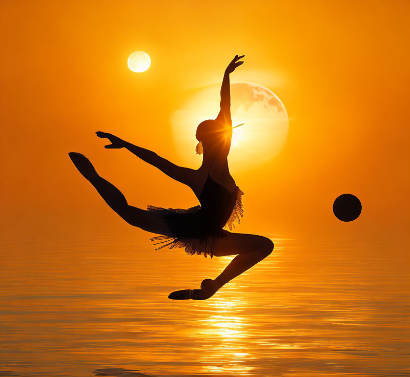 Silhouette of ballet dancer in elegant pose at sunset with celestial orbs