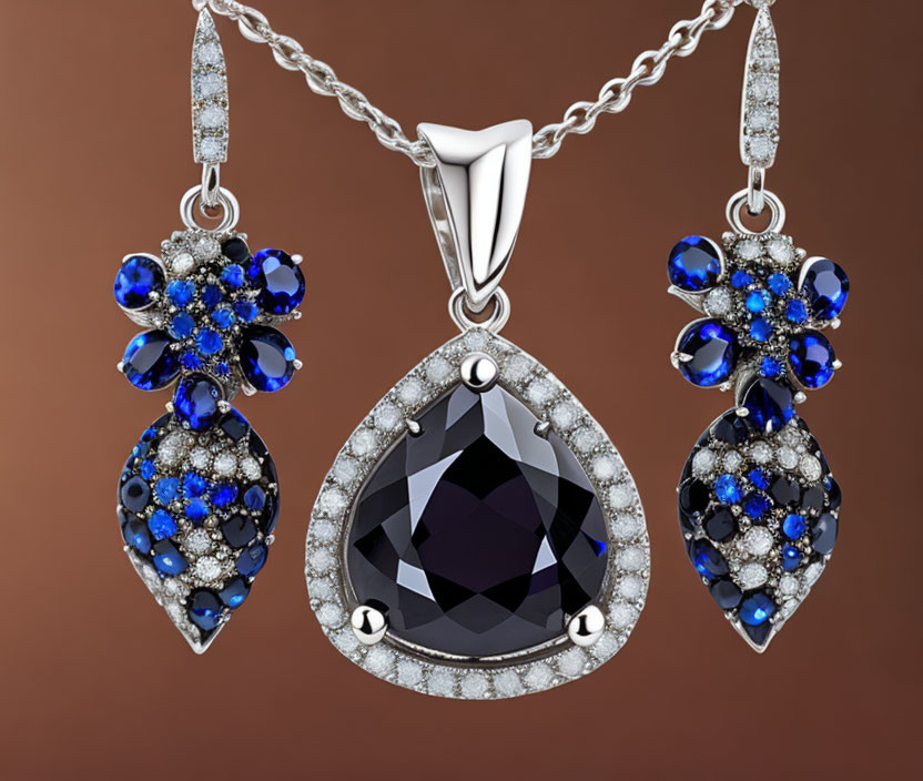  White gold with black and blue sapphires and diam