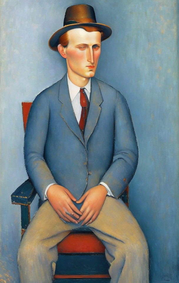 A man sitting on a chair with a hat on his head