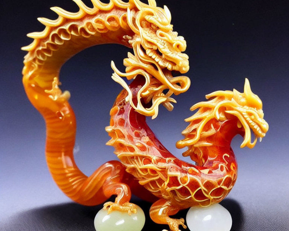 Vibrant Orange and Yellow Jadeite Chinese Dragon Carving with Two Orbs
