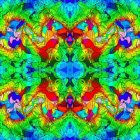 Symmetrical fractal design with kaleidoscopic patterns in blue, green, yellow, and red