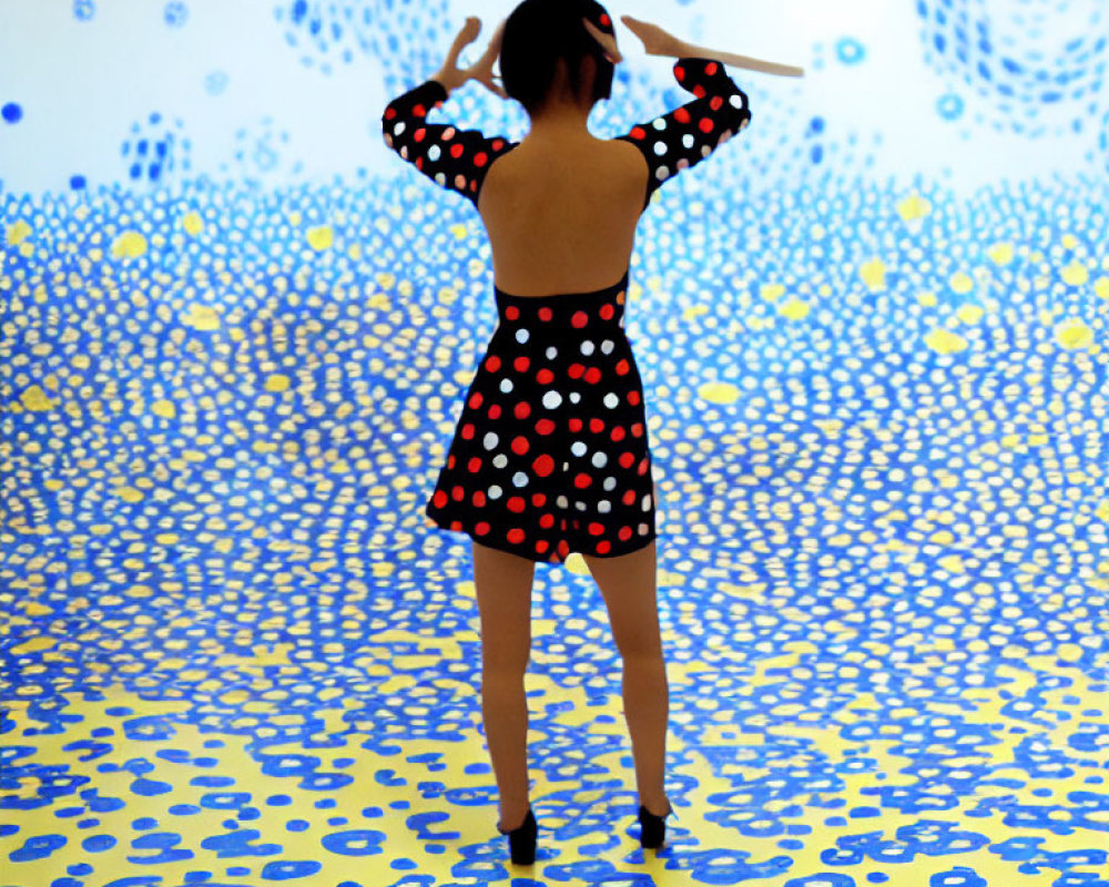 Woman in Polka Dot Dress in Blue and Yellow Polka Dot Art Installation Room