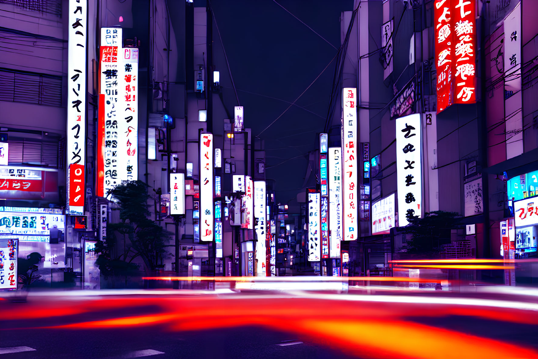 Vibrant Night Street with Japanese Neon Signs and Blurred Vehicle Lights