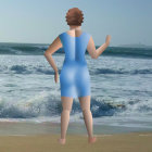 Woman in flowing blue dress gazes at sea on beach