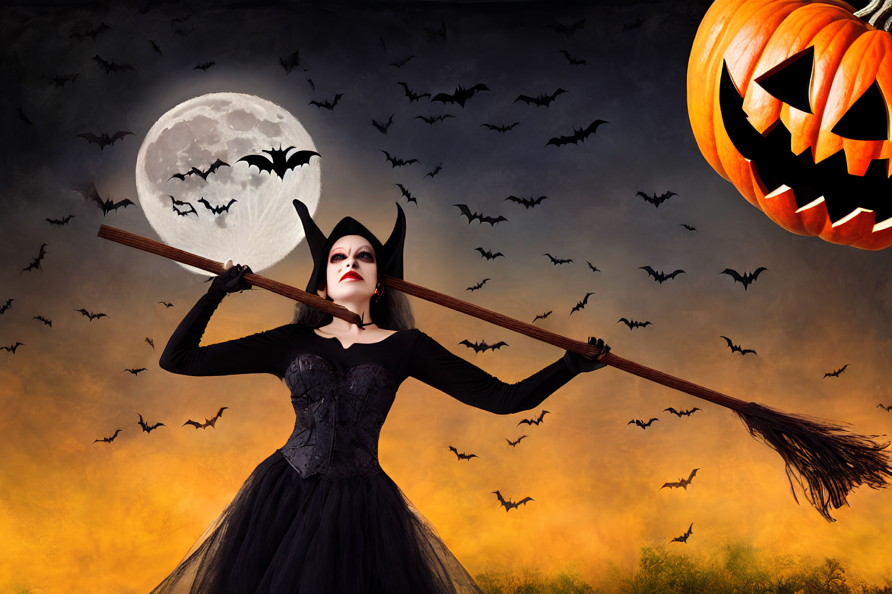 Woman in witch costume with broomstick under full moon and jack-o'-lantern.