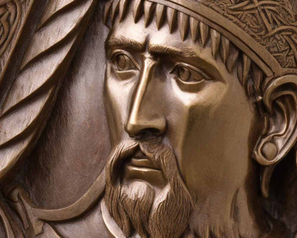 Bronze bas-relief of a medieval king with detailed crown and armor