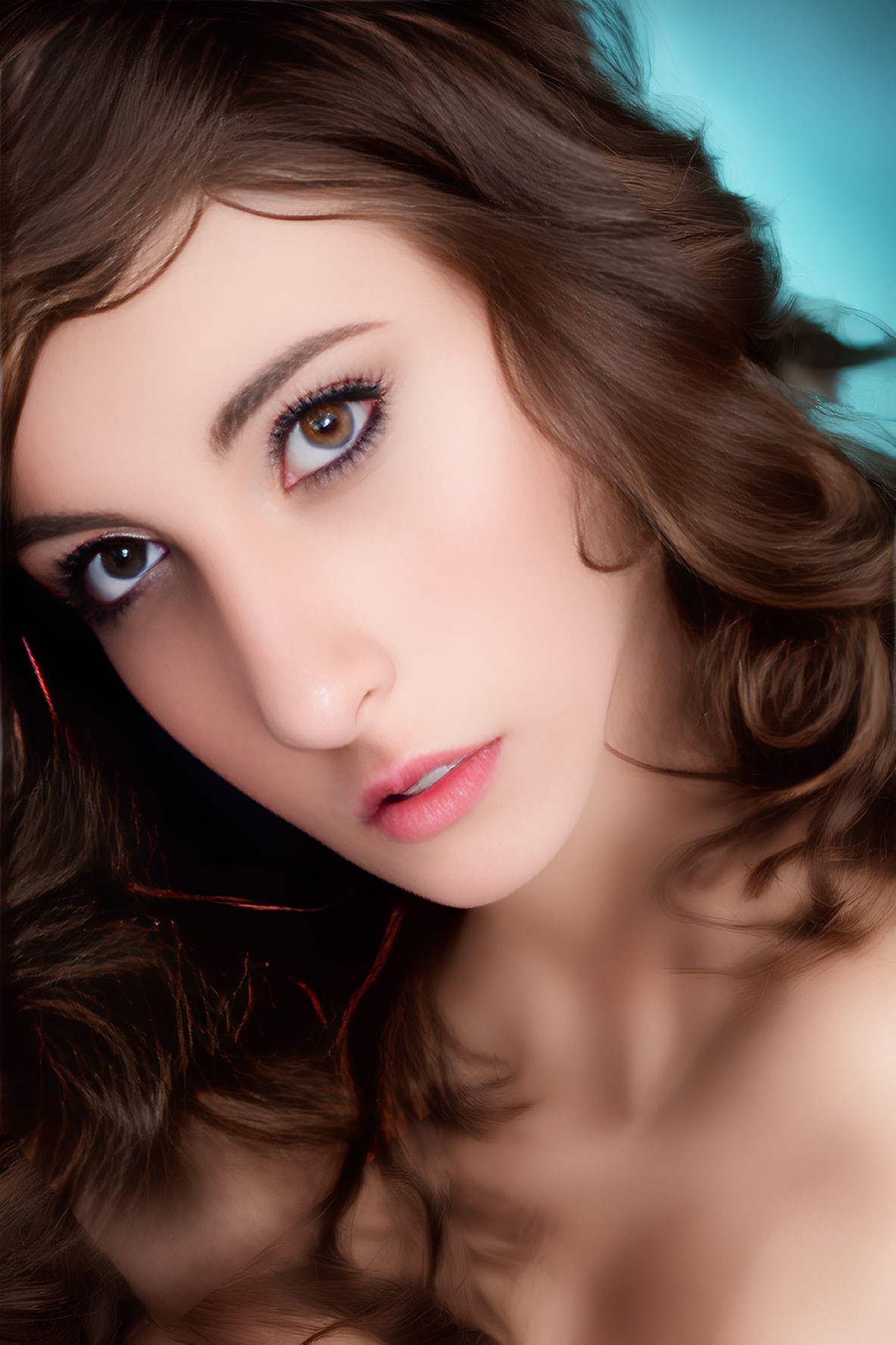 Portrait of Woman with Wavy Brown Hair and Intense Eyes on Blue Background