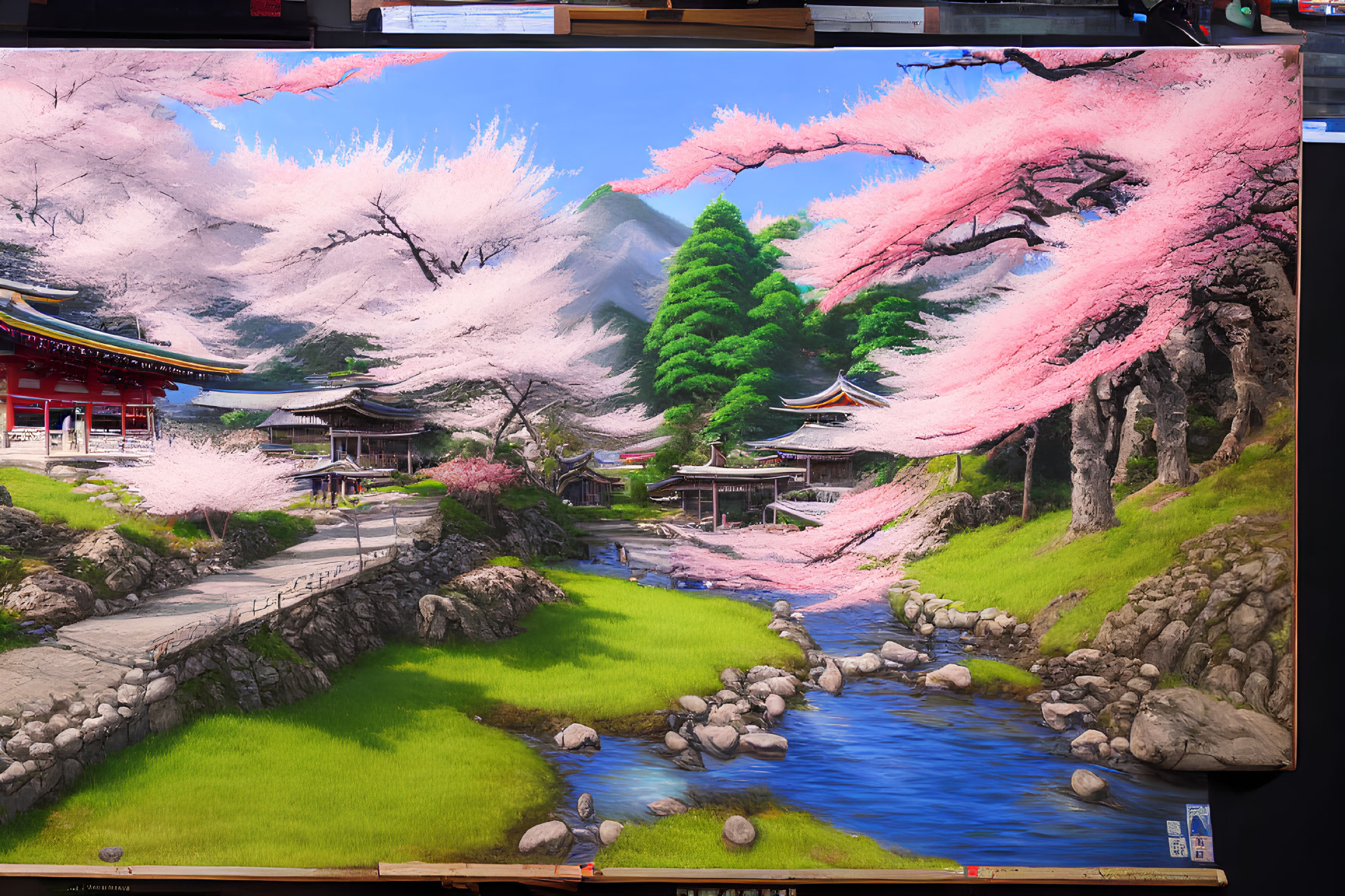 Japanese landscape with cherry blossoms, stream, traditional buildings, and blue sky
