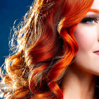 Vibrant red-haired woman with blue eyes on blue background