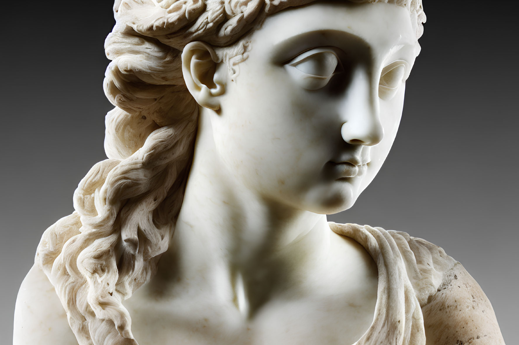 Classical marble statue of woman with intricate curls and calm expression