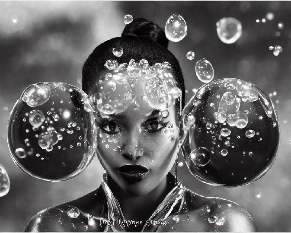 Monochrome artistic portrait of a woman surrounded by bubbles