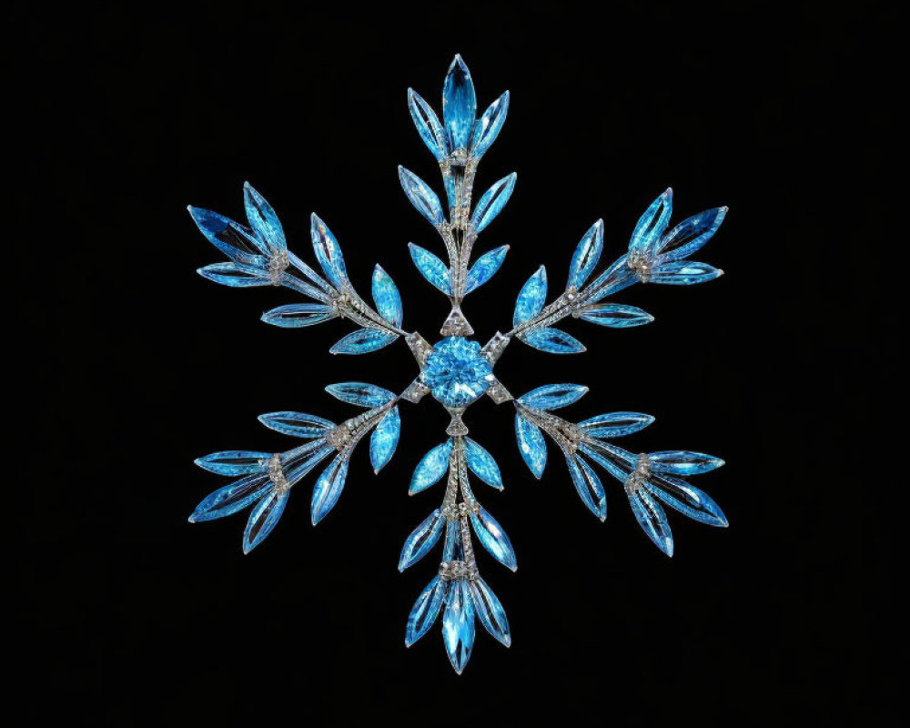 Snowflake-Shaped Jewelry with Blue Gems and Diamond Center on Black Background