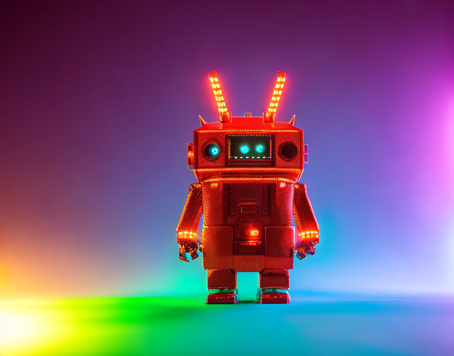 Vintage Toy Robot with Illuminated Eyes on Colorful Background
