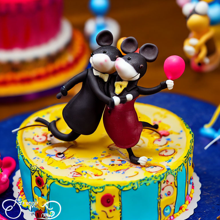 Fondant mice cake toppers dancing on vibrant blue cake with pink layer.