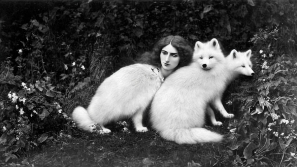 Vintage Black and White Photo: Woman with White Foxes in Garden